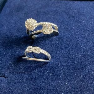 Lot of 4 stackable silver toned costume jewelry rings